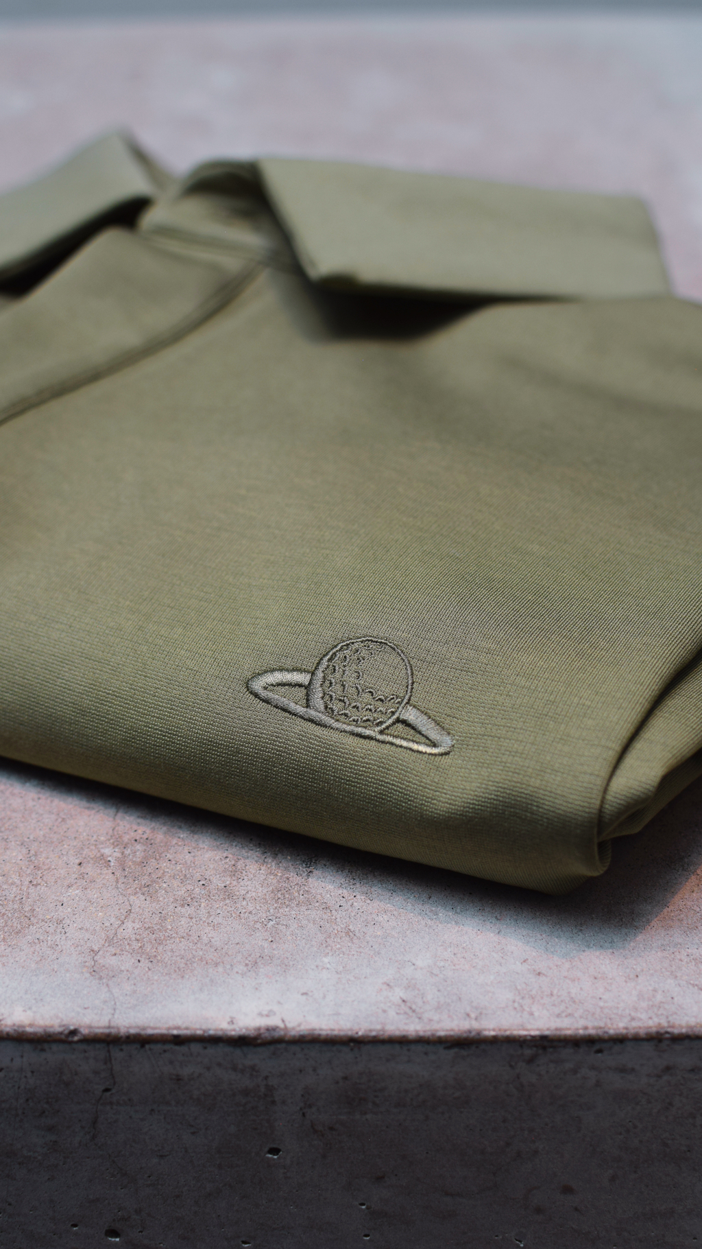 The Narooma Polo olive green front view