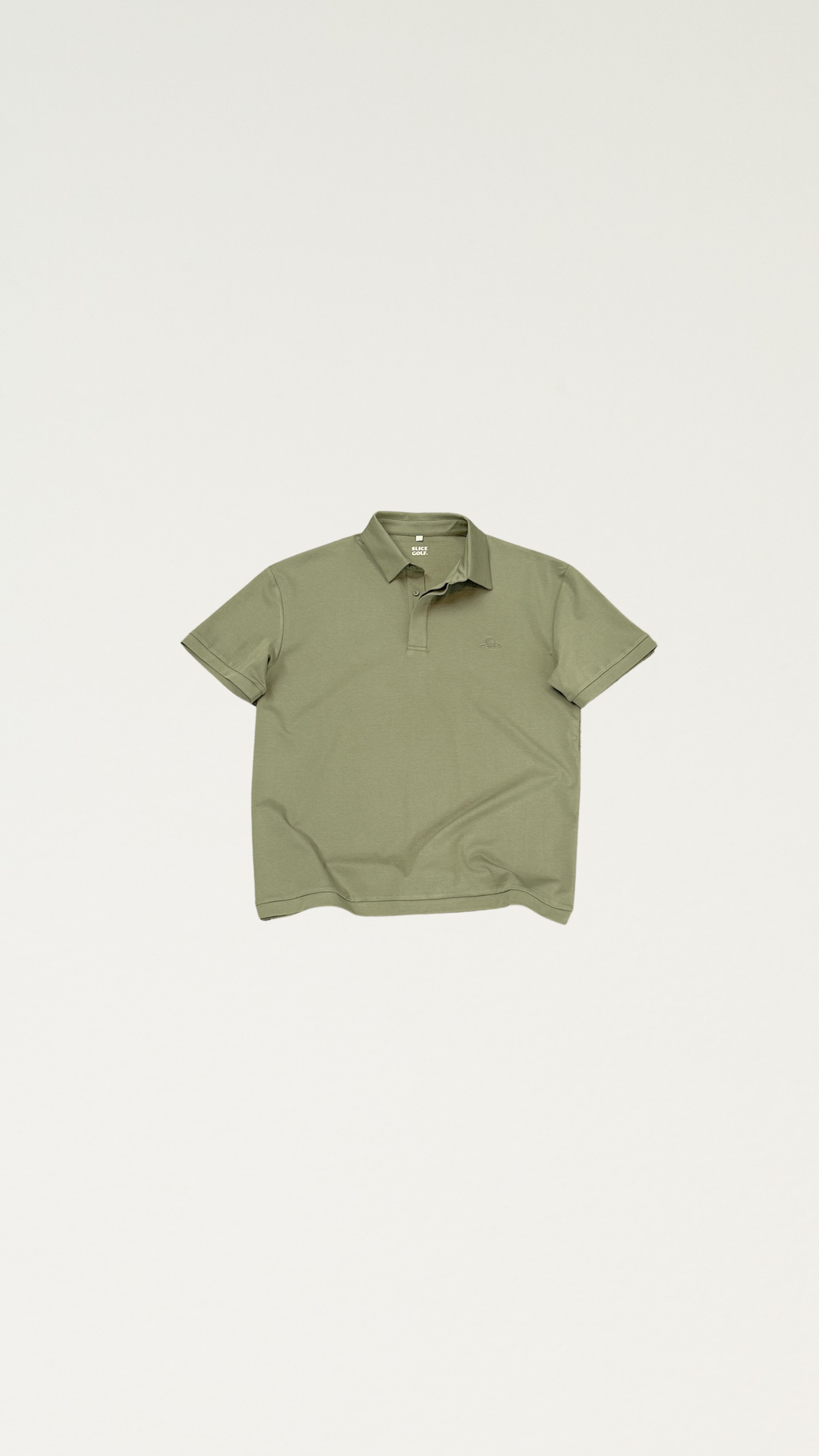 The Narooma Polo in olive green, product flat lay
