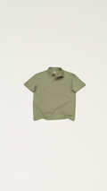 The Narooma Polo in olive green, product flat lay
