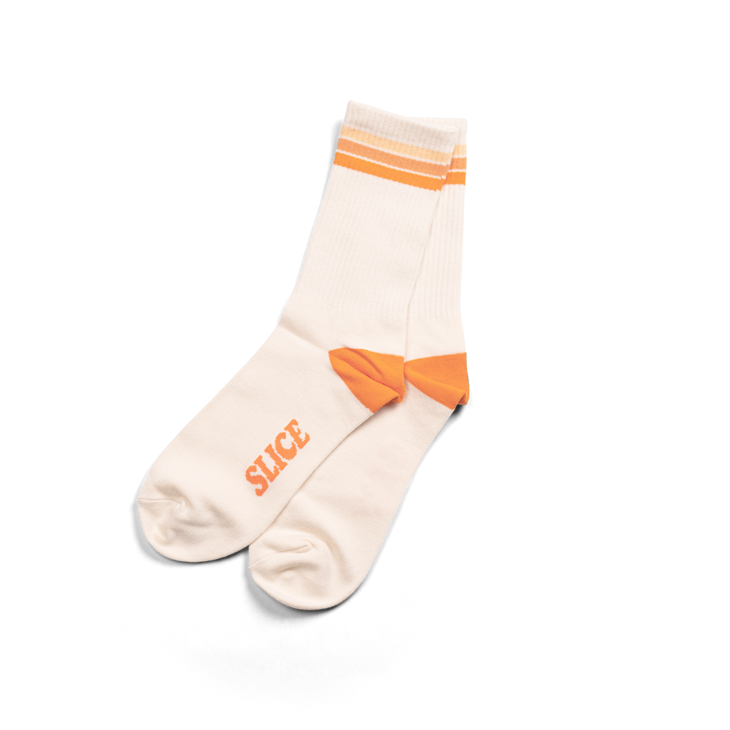 Golf sports socks in white with orange stripes.
