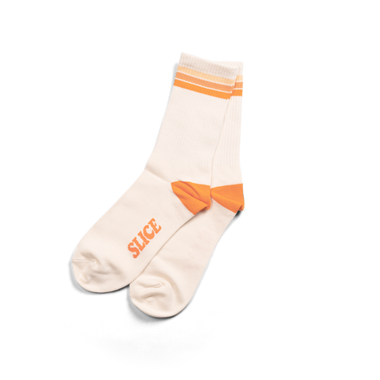 Golf sports socks in white with orange stripes.