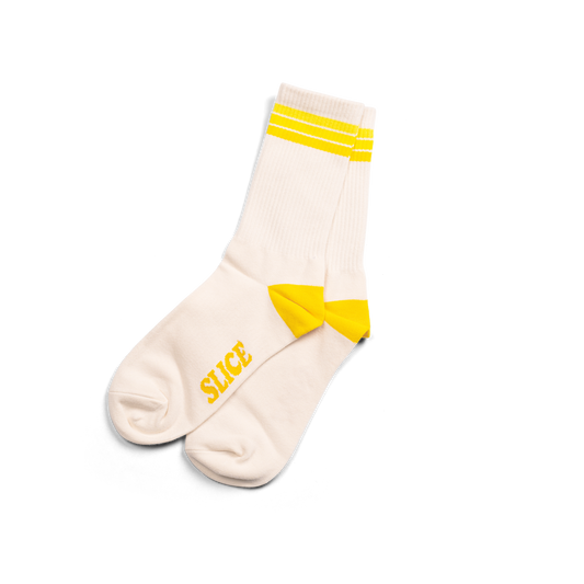 Golf sports socks in white with yellow stripes.