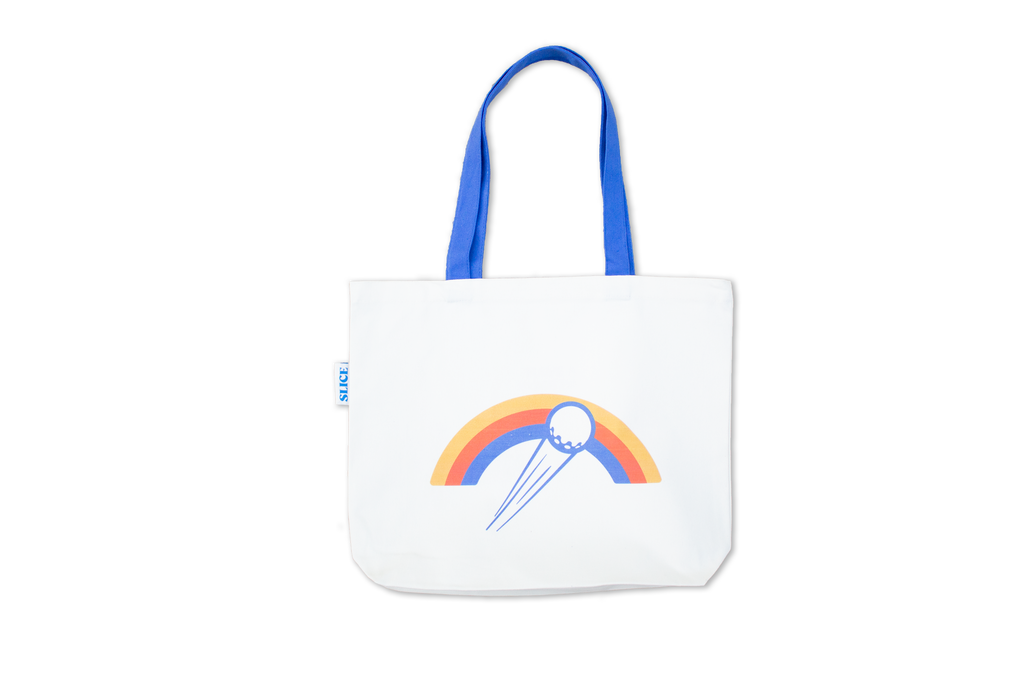 Organic cotton tote back in off-white with Slice Golf rainbow logo and blue handle.